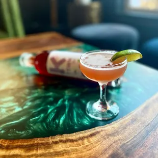 a cocktail in a coupe glass