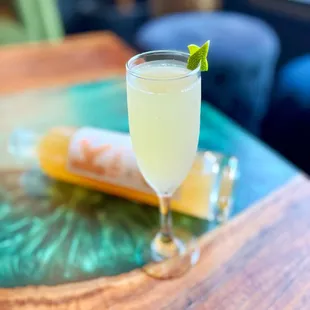 a glass of wine on a table