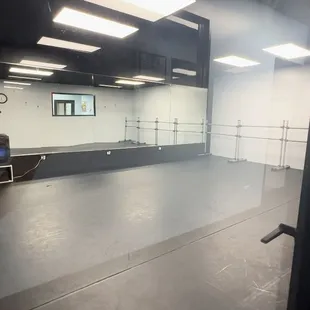 Room B.  A 30x30 room with a spring floor and Harlequin Marley