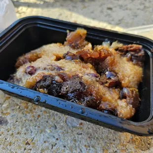 a piece of food in a plastic container