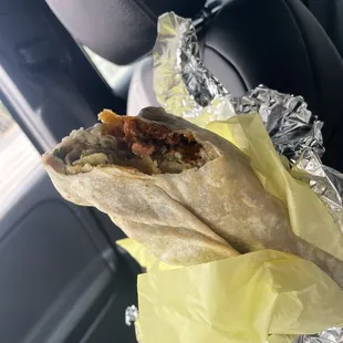 Al pastor green chilaquiles burrito.