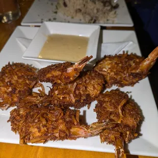 Coconut Shrimp - 
 Crispy coconut shrimp served with garlic aioli sauce
