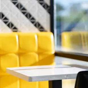 a table and chairs in a restaurant