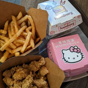 a box of fried chicken and a box of french fries