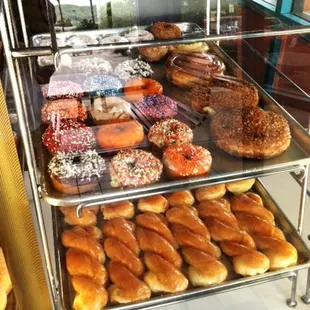 One of several displays with delectable delights in Miss Donuts Shop.