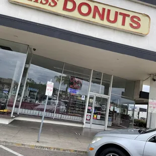 a car parked in front of the store