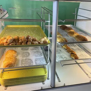 a display of pastries in a bakery