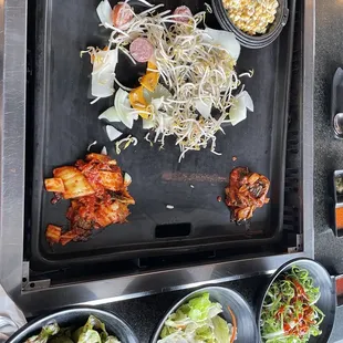 a grill with a lot of food on it