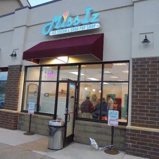 Outside of the shop, view looking southwest.
