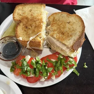 Turkey Reuben with tomato caprese and Almond Grape Chicken Salad with avocado side
