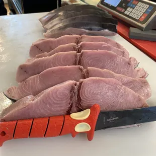 Quality swordfish cut to your liking! Quality Sharp knives are a must!