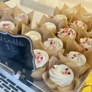 a display of cupcakes