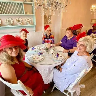 a group of women sitting at a table