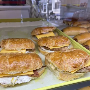 Breakfast sandwiches, egg, cheese and bacon.