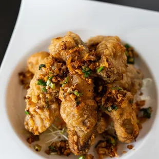 Crispy Chicken Wings - Seasoned, crispy chicken wings with garlic butter or salt and pepper style