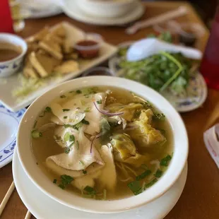 Pho with egg noodles, chicken and wontons.