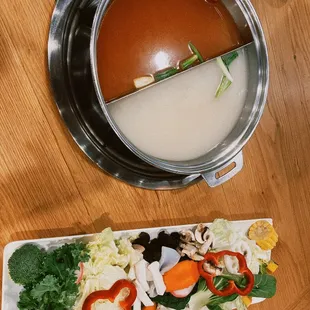 AYCE house broth along with kimchi