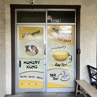 Door of the business; all locked up with no directions, but you just ring the doorbell to the right!