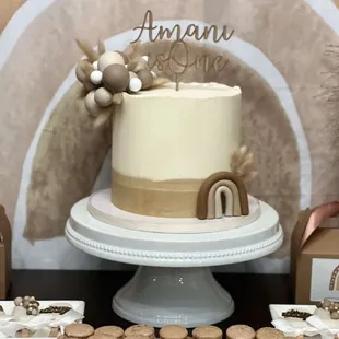 a cake and cookies on a table