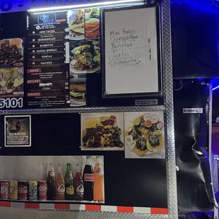 a food truck with menus on it