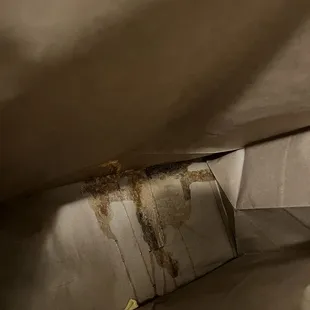 Juice from sweet potatoes at the bottom of the bag