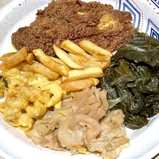 Catfish filet, collards, cabbage, Mac and cheese, and Cajun fries ((this is my plate at home))