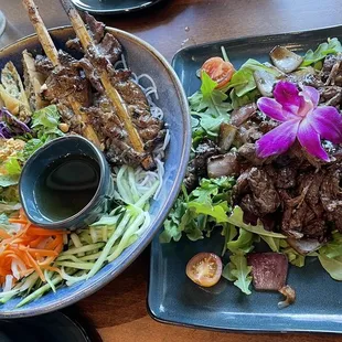 Charbroiled shrimp and pork, crispy Eggroll vermicelli  Shaking beef bed with fresh arugula topped with light, tasty house dressing!!!