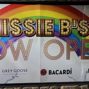 a sign for the opening