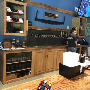 two women standing at the bar
