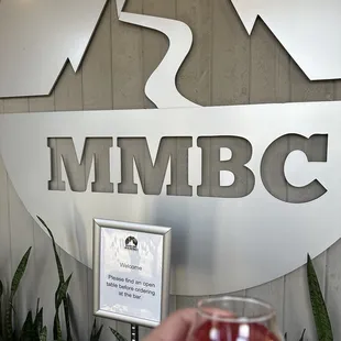 a person holding a drink