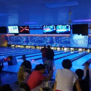 a bowling alley full of people