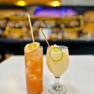 two cocktails on a table