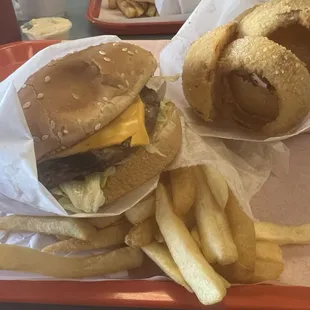 Cheeseburger, fries and onion rings.
