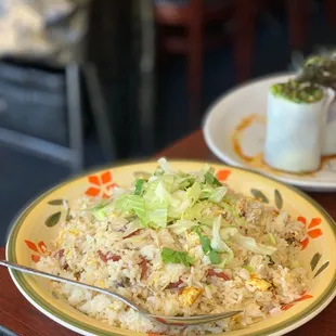 a plate of fried rice and a cup of coffee