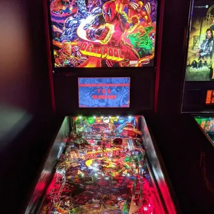 a pinball machine in a dark room