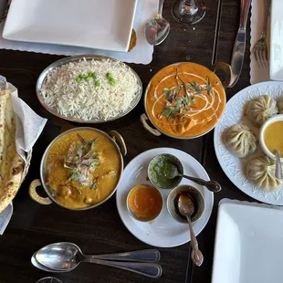 Garlic Naan, Papadum, Coconut Lamb Curry, Chicken Tikka Masala, Vegetable Momo