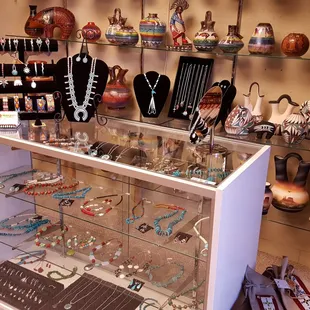 Shop for authentic Native American silver and turquoise jewelry, handcrafted horse hair and etched pottery.