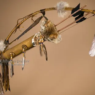 Native American artifacts like bows, shields and lances make great rustic wall decor and many useful items like knives, hatch...