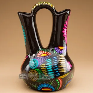 Classic Native American pottery and wedding vases for collectors and home decor.