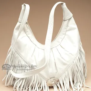 Genuine leather purses for southwest and western style handbags are a perfect match.