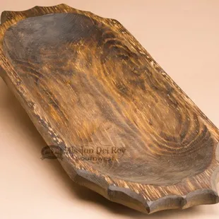 Rustic old style dough bowls make great centerpieces for Southwest decor.