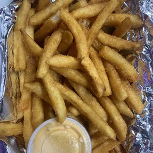 Basket of fries with dipping sauce