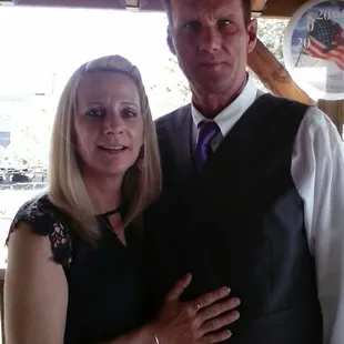 a man and woman posing for a picture