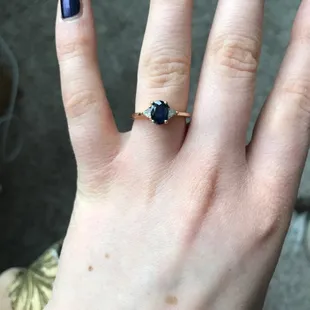 sapphire and 14 karat gold ring resized from an eight to a six.