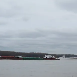 A barge going upstream, the other going downstream.