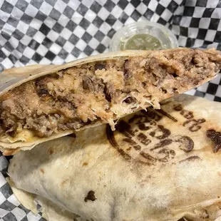 Inside shot of the burrito.  This makes my insides happy!!  That green salsa makes me wholly happy!