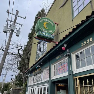 The sign infront of the entry