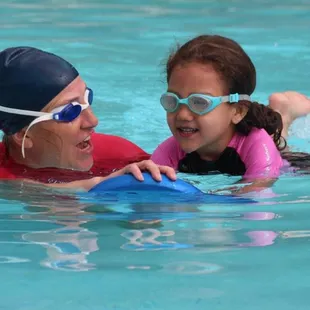 Miss Jean working on kicking and bubbles