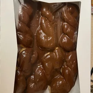 a box of chocolate donuts