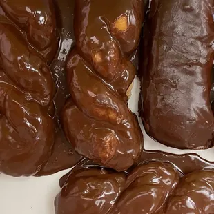 a variety of chocolate donuts